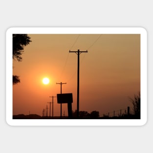 Smokey Kansas Sunset with tree's and power lines. Sticker